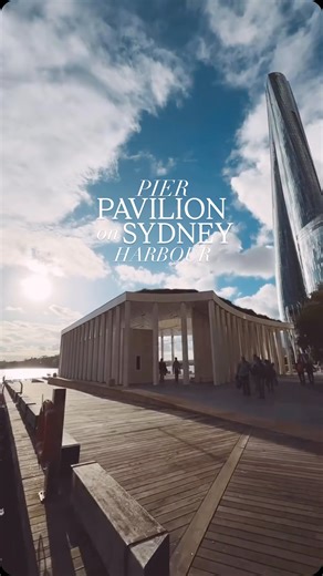 Sydney Chronicles | Travel, Lifestyle & Directory on Instagram: "Have you been to this pavilion in Sydney?✨ Nestled along the glistening edge of Barangaroo, Pier Pavilion is more than just a waterfront retreat—it’s a design masterpiece where the land, sea, and sky come together in perfect harmony. With sweeping harbour views, open seating, and a façade made from over 450,000 recycled Sydney rock oysters, this stunning space invites you to pause, gather, and connect. Designed by Besley & Spresser