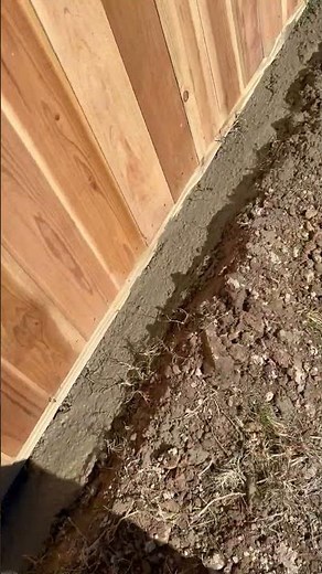 Stop Dogs Digging Under Fence | Concrete Footer Fence Barrier Install - DefenderFences.com