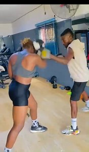 Boxing is more than a sport; it's a lifestyle. Experience the grit and grace of this female boxer and her coach as they chase their dreams. what's that one word that describes Black Tito?🥊💫 . #FlykiteBoxing #boxingfitness #BoxingEntertainment #BoxingJourney #GOtvBoxing #TrainingLife | Flykite Boxing