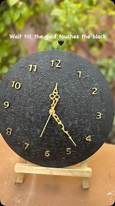 Turning a black round canvas into a luxury handmade wall clock 🖤❤️ Textured with wall putty paste, stencil detailing in black & gold acrylics, handmade clay numbers and a clock mechanism. Minimal colors. Bold texture. Timeless art. Would you hang this on your wall? 👀👇 Save for decor inspiration ✨ #handmadeart #wallclockdesign #texturedart #blackandgold #homedecor handmade wall clock textured wall art black and gold decor luxury wall decor DIY wall clock canvas wall art modern home decor textu