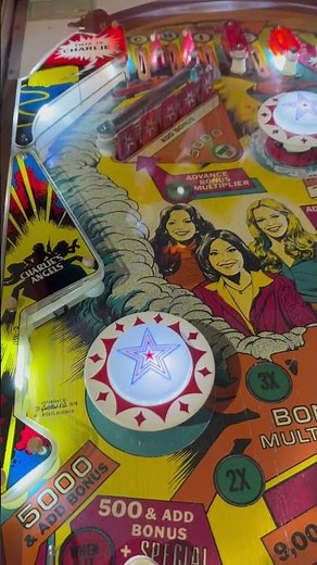 1970s memories. Charlie’s Angels Pinball Machine. Cheryl Ladd or Farrah Fawcett.
