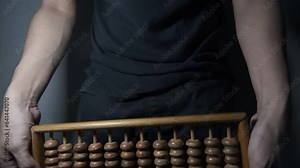 sempoa. Made of wood. The abacus is a highly effective counting tool that has been widely used worldwide for centuries. accounting, calculator, finance, mathematics, retro, traditional, computing.