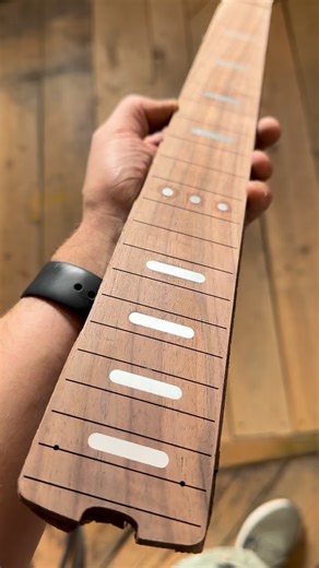 Walnut fretboard with aluminum inlays for that green TC is shaping up nicely. | Jones’n Music