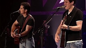 We agree with Brad Paisley—this has to be one of our favorite John Mayer songs. 😌 Relive this #CMTcrossroads moment when these two take on “Daughters.” | CMT Crossroads