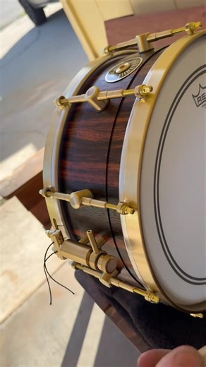 14x5.5” Macassar Ebony step stave. All solid brass hardware with petal inlays. #cherryhilldrums #macassarebony | Cherry Hill Drums