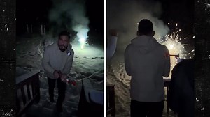Alex Pereira Lights Firework During New Year's Celebration
