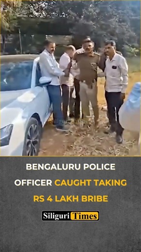 #Viral | Bengaluru police officer caught taking bribe