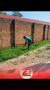 Station Manager Radio Pacis Mr. Gaetano Apamaku slashing during our Symbolic Community service day 2024 as we Clean from Radio Pacis to Ediofe Trading Centre. #CommunityServiceDay2024 #RadioPacisAt20 #PeaceOfChristForAll | Radio Pacis