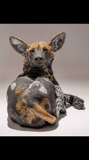 Painted dog sculptures now available @beaux_arts_bath. Just like dogs themselves, all my ceramic sculptures are unique with their own personality. These beautiful animals are my favourites to sculpt. #painteddog #wilddog #safari #doglovers #dogportrait #animalsculpture #sculpture #wildlifelovers #animallovers #nickmackman | Nick Mackman Animal Sculpture