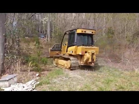 Wildland fire fighting, dozer cutting fire line