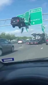 Truck Stuck in Highway Sign: What Happened?!