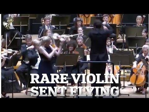 Conductor hits £1million violin into the air mid-concert