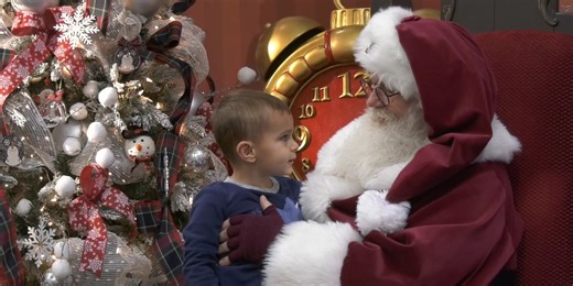 Kids and parents line up to meet St. Nick at North Pole Santa Claus House