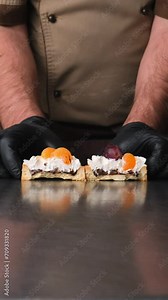 The pastry chef cuts a chocolate tart, a tart with creamy fruit filling, a tart with nuts in salted caramel and a creamy cheese top and shows a delicious filling
