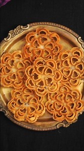 Achu Murukku Recipe | Eggless Rose Cookies With Coconut Milk | Achappam | Christmas Special Recipes Like And Follow Us On: Instagram – https://www.instagram.com/shecooks_official/ Facebook – https://www.facebook.com/shecooksNbakes/ WhatsApp https://www.whatsapp.com/channel/0029VaCVXqwGU3BMfjlOyL18 Pinterest – https://in.pinterest.com/shecooks_official/ YouTube - https://www.youtube.com/c/SheCooks/videos Twitter – https://twitter.com/SheCooksnBakes Ingredients: 1 Cup Rice Flour 1/2 Cup Maida (Pla