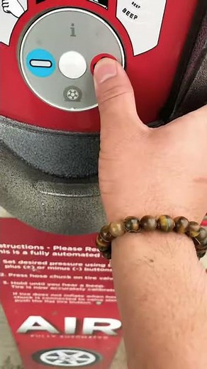 Filling Air in Tires At Gas Station