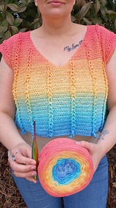 Are we loving the look so far? 👀😍 . Here is a little #wip update on my current project, the #BraidedWithLoveSweater . Using small yarn comes with little progress. Normally, I would be done by now, but since this is sport weight yarn, it's taking me FOREVVVVVVEEEERRRR🙈😭 . On a side note, I have now finished the first 2 cakes & am about to start the 2nd set of cakes. Now I have to decide if I should reverse the colors, making it start at the blue & fade back to green & yellow. Or if I should h