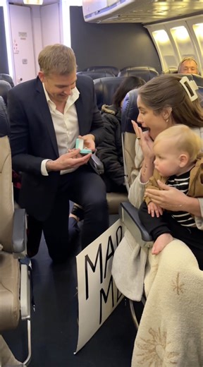 Pilot proposes over intercom! ❤️ Pilot proposes to his girlfriend mid flight using the intercom system to surprise her and the help of friendly passengers in this sweet story of love in the sky. #couplegoals #couple #flight #family #plane #viralvideo #blessed #proposal | Nick K