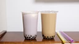 Boba or tapioca pearls is taiwan bubble milk tea in plastic cup with...