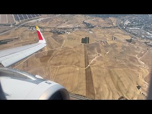 Iberia A320neo Business Class Madrid to London (Windy Landing)