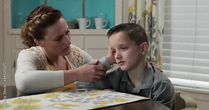 Mother Wipes Child's Tear 4K 60fps