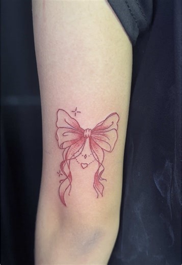 Red Bow Tattoo: Minimalist Ink Inspiration