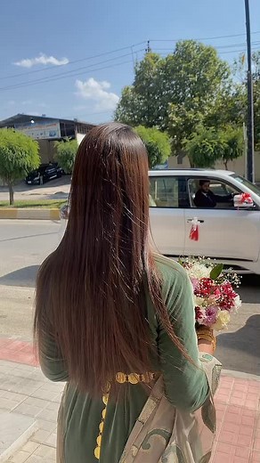 Beautiful Floral Arrangement on Car in Sunny Suburb