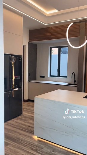 Modern kitchen completed for another great client, joining the ‘Jozi Kitchens Family’ - Modern design - Gola rails ie. no physical handles - Egger Matt finish with fingerprint resistant finish - Aluminium Glass Doors - Veneer wooden doors - Coloured Carcasses - Full BLUM hardware and pullouts @jozi_kitchens •Kitchen Design •Full House / New Build Homes •Turnkey renovations •Modern Bars •BIC’s, Vanities and TV units www.jozikitchens.co.za Showrooms: 011 262 0461 Sandton (Open Sat 9am - 2pm) 010 2