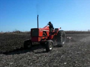 Allis-Chalmers 190XT Series III & Allis Chalmers Chisel Plow