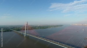 aerial shoot video of jiujiang cable-stayed bridge with the yangtze river, China