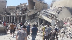 Rescuers battle to reach victims of Aleppo wake barrel bombing
