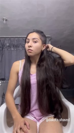 Dakota | Thick hair once flowing, now falling 💇🏻‍♀️ a quiet rain of transformation ✂️ 🌧️ . Follow @dakota.shaved for more ✂️ | Instagram