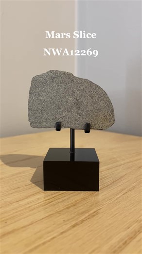 After an impact from a large-scale asteroid or comet to Mars surface, Martian rock can become free-floating objects in space called meteoroids. These meteoroids then travel through the solar system, often for millions of years, before encountering Earth's gravitational pull. If the meteoroid is large enough and survives the atmospheric entry, it reaches the Earth's surface as a meteorite. Featured: Mars Slice (NWA12269) Approximately 3.8 billion years old 6 x 4 x 0.2 cm North West Africa Bespoke