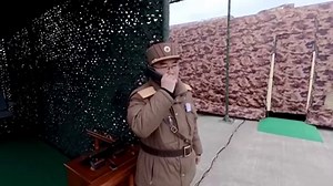 Kim Jong Un and daughter oversee test of 12 nuclear-capable rocket launchers