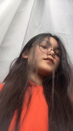 Engaging Hand Gestures Performance in Bright Attire