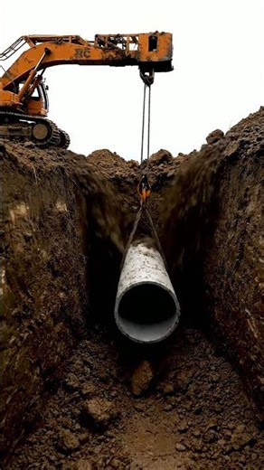 Heavy Pipe Installation: Excavator Trench Work in Action! 🏗️