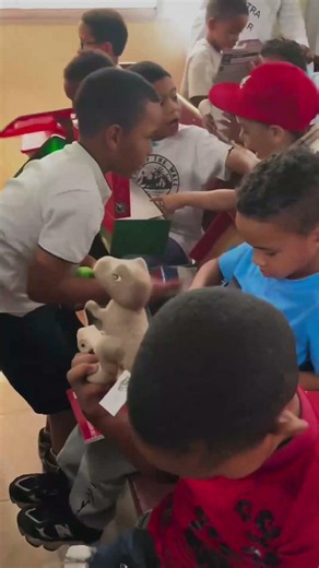 Two Kids From The Dominican Republic Show Off Their Shoebox Gifts
