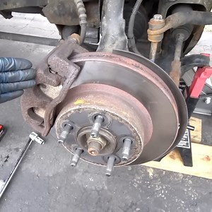 Got Squeaky Brakes? Here's How To Fix It! | ChrisFix