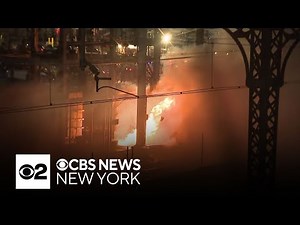 Transformer explosion ignites fire along Amtrak tracks in the Bronx