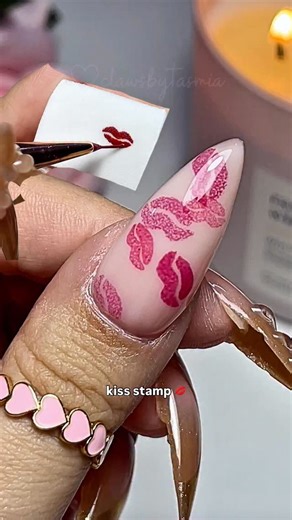 Montreal Nail Tech and Educator🇨🇦💫 on Instagram: "KISS STAMPING TUTORIAL 💋💕 here’s how I do my stamped kisses so it looks like someone kissed the nail for real🥹 love these!! For a full tutorial, check out my YT!💞 - - - - - - - - Kiss nails, nail stamp , nail stamping , nail decal , Valentine’s Day nails, natural nails, milky white nails, pink nails, red nails, satisfying nails, nail hack , lip nails ,"