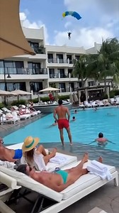 It is a Hot Day 😅 #weirdworld #parachute #landing #swimming | Weird World