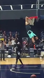 Incredible behind the back arm dunk