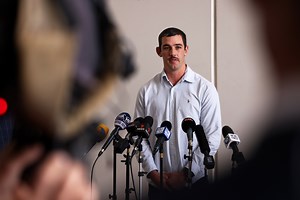 Taylor Walker sits with Robbie Young in video apology