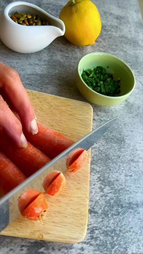 This 5-Minute Raw Carrot Salad is made with just 4 budget-friendly ingredients. Packed with antioxidants and vitamins, this gut-healthy recipe is the perfect snack or side. It's crunchy, tangy, and slightly sweet, making it an easy and delicious way to get more veggies into your diet. | Cooking for Peanuts