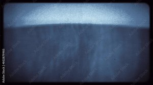 Old style computer display with fast moving images, glitch effects, static, and flashes.