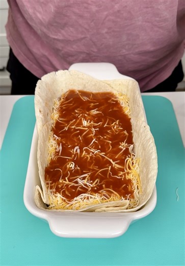 460K views · 2.4K reactions | My Family Loves This Easy Dinner! Danny N shows us how to make a delicious dinner using tortillas, refried beans, ground beef, taco seasoning, Mexican four cheese, red enchilada sauce and diced green chiles. | Danny N’s Kitchen | Facebook