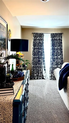 Who knew a few curtains could completely change the vibe? Our latest release brought warmth, comfort, and just the right touch of glam to this once-basic basement. Now it’s the spot everyone actually wants to hang out in! 💐 Featured: Britt Collection, Cypress, Pinch Pleat with Back Tab 🎥:@miss.tammy70 #twopageshome #curtains #draperies #windowcoverings #interiordecoration #interiordesign #homedecor #creator #interiordecorator #homestyling #antiques | Twopagescurtains