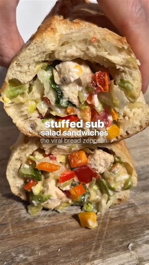 Erin Silberman on Instagram: "Stuffed Sub Salad Sandwich (Bread Zeppelin) •Follow @seriousfoodfetish for more recipes, restaurant recs & food trends• This is one of my favorite chopped sandwiches yet! Inspired by the viral @breadzeppelin in Texas, this is a STUFFED sub sandwich… insane. This place takes fresh baguettes & packs them with a loaded chopped salad. Hear me out - baguettes are kind of skinny, so it’s hard to fit all those ingredients on the bread. This allows you to get a little bit o