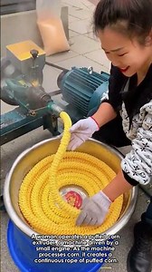 Woman Making Puffed Corn with Extruder
