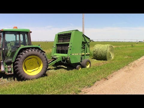 Baling Hay With A JD 535 Round Baler